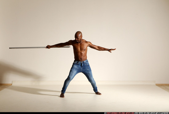 Man Adult Athletic Black Fighting with spear Moving poses Pants