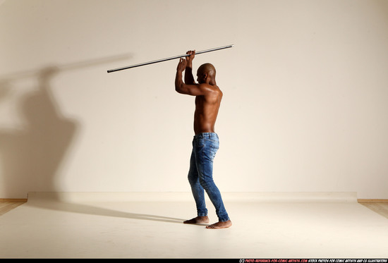 Man Adult Athletic Black Fighting with spear Moving poses Pants