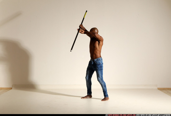 Man Adult Athletic Black Fighting with spear Moving poses Pants