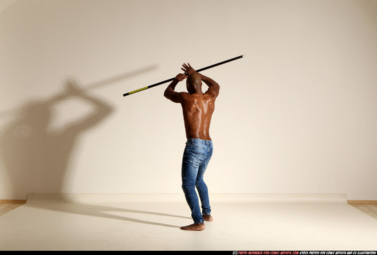 Man Adult Athletic Black Fighting with spear Moving poses Pants