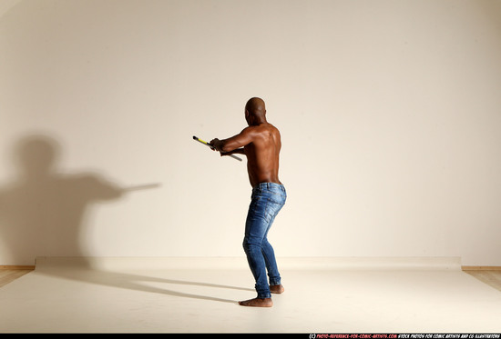 Man Adult Athletic Black Fighting with spear Moving poses Pants