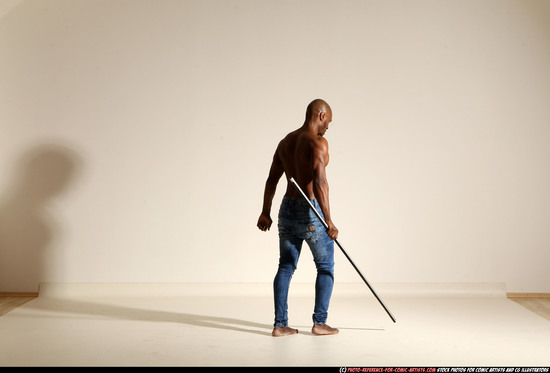 Man Adult Athletic Black Fighting with spear Moving poses Pants