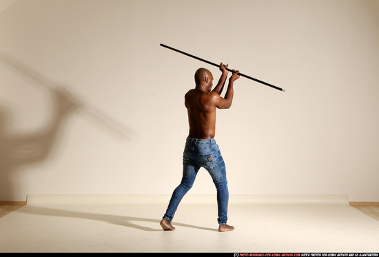 Man Adult Athletic Black Fighting with spear Moving poses Pants