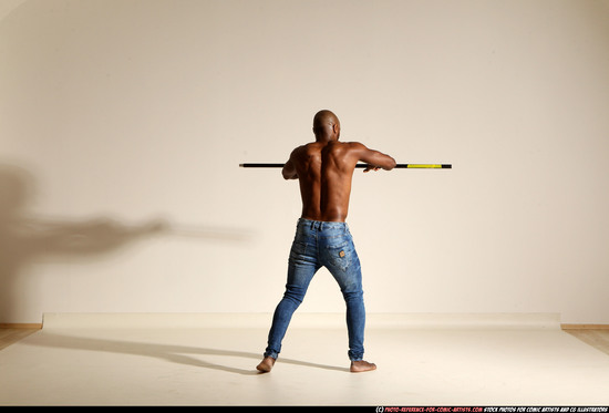 Man Adult Athletic Black Fighting with spear Moving poses Pants