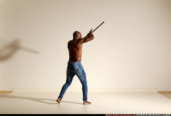 Man Adult Athletic Black Fighting with spear Moving poses Pants