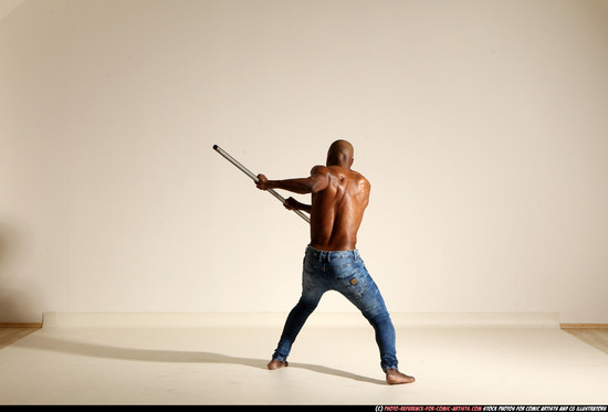 Man Adult Athletic Black Fighting with spear Moving poses Pants