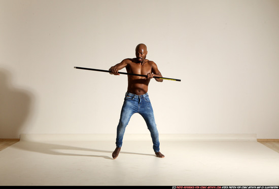 Man Adult Athletic Black Fighting with spear Moving poses Pants