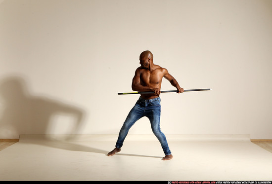 Man Adult Athletic Black Fighting with spear Moving poses Pants