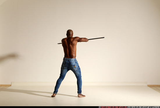 Man Adult Athletic Black Fighting with spear Moving poses Pants