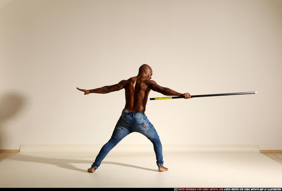 Man Adult Athletic Black Fighting with spear Moving poses Pants