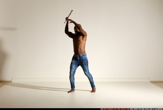 Man Adult Athletic Black Fighting with spear Moving poses Pants