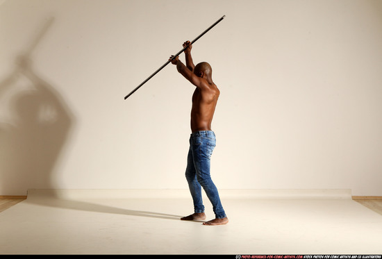 Man Adult Athletic Black Fighting with spear Moving poses Pants