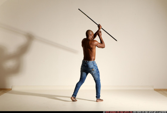 Man Adult Athletic Black Fighting with spear Moving poses Pants