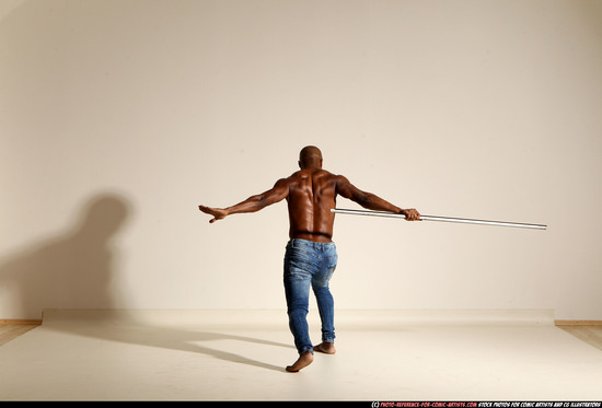 Man Adult Athletic Black Fighting with spear Moving poses Pants