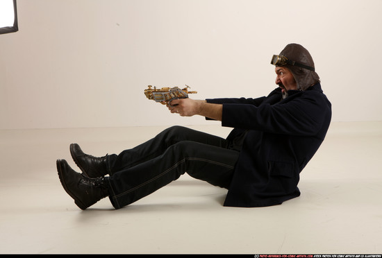 Man Old Average White Fighting with gun Sitting poses Casual