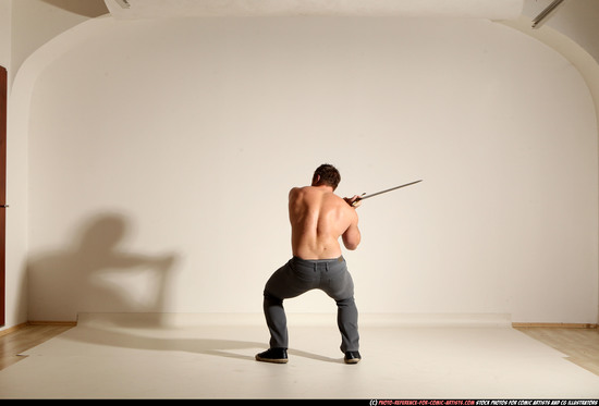 Man Adult Muscular White Fighting with sword Moving poses Casual