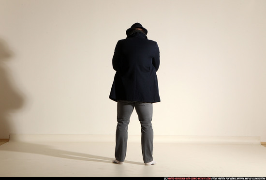 Man Adult Muscular White Fighting with gun Standing poses Coat