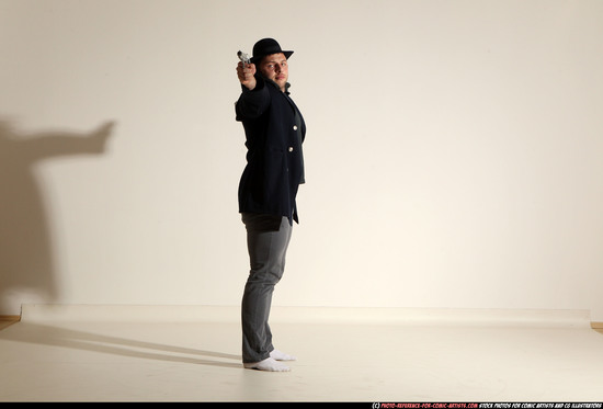 Man Adult Muscular White Fighting with gun Standing poses Coat