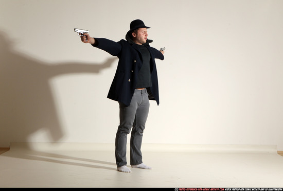 Man Adult Muscular White Fighting with gun Standing poses Coat