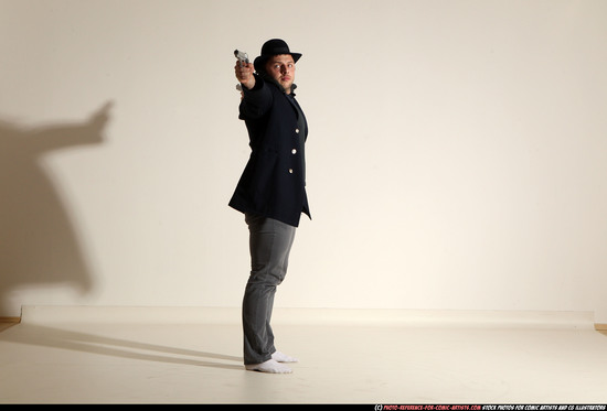 Man Adult Muscular White Fighting with gun Standing poses Coat