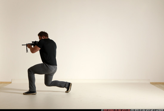 Man Adult Muscular White Fighting with submachine gun Moving poses Casual