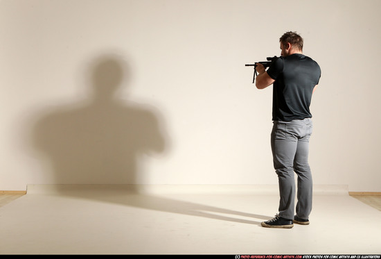 Man Adult Muscular White Fighting with submachine gun Moving poses Casual