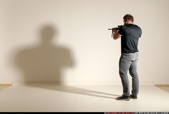 Man Adult Muscular White Fighting with submachine gun Moving poses Casual