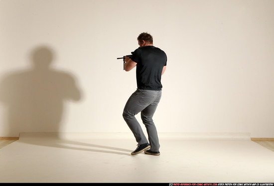 Man Adult Muscular White Fighting with submachine gun Moving poses Casual