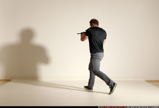 Man Adult Muscular White Fighting with submachine gun Moving poses Casual