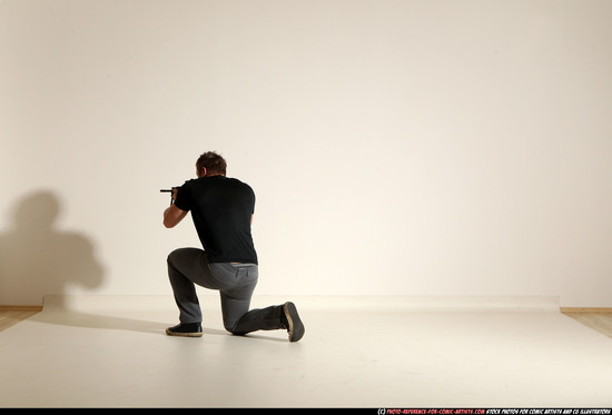 Man Adult Muscular White Fighting with submachine gun Moving poses Casual