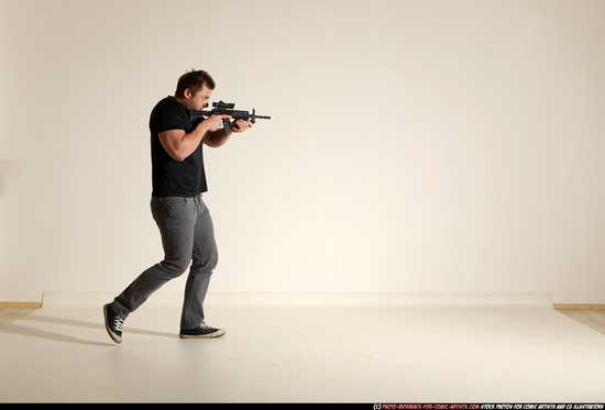 Man Adult Muscular White Fighting with submachine gun Moving poses Casual