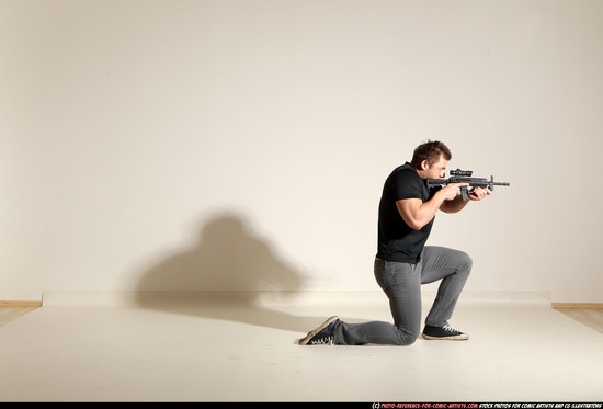 Man Adult Muscular White Fighting with submachine gun Moving poses Casual