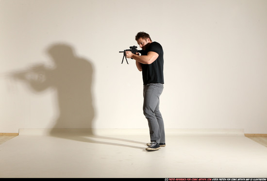 Man Adult Muscular White Fighting with submachine gun Moving poses Casual