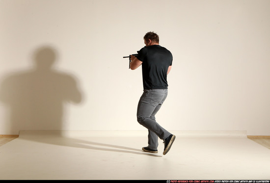 Man Adult Muscular White Fighting with submachine gun Moving poses Casual