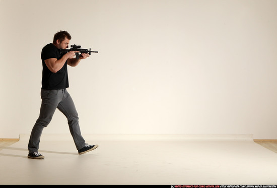 Man Adult Muscular White Fighting with submachine gun Moving poses Casual