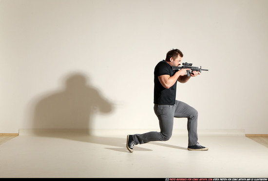 Man Adult Muscular White Fighting with submachine gun Moving poses Casual