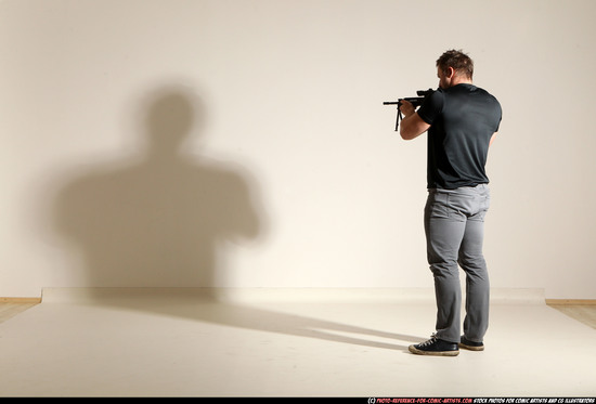 Man Adult Muscular White Fighting with submachine gun Moving poses Casual