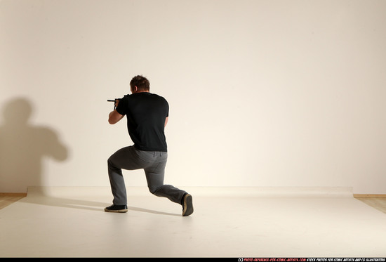 Man Adult Muscular White Fighting with submachine gun Moving poses Casual