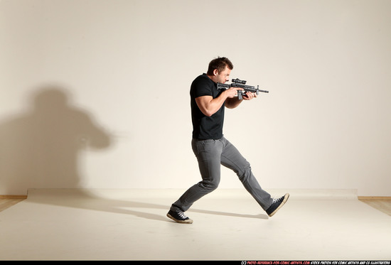 Man Adult Muscular White Fighting with submachine gun Moving poses Casual