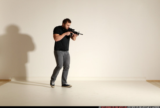 Man Adult Muscular White Fighting with submachine gun Moving poses Casual