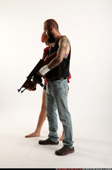 Man & Woman Adult Athletic White Fighting with submachine gun Standing poses Casual