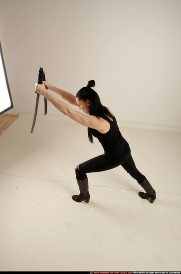 Woman Adult Athletic White Fighting with sword Standing poses Casual