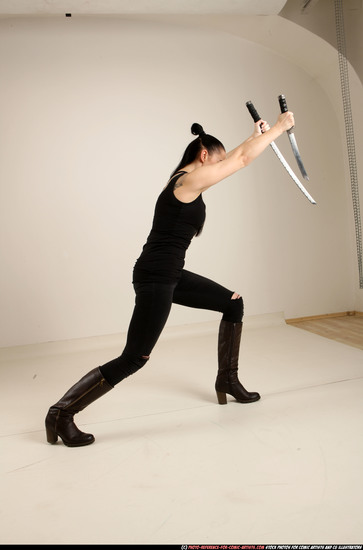 Woman Adult Athletic White Fighting with sword Standing poses Casual