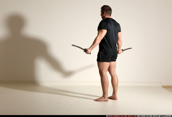 Man Adult Muscular White Fighting with sword Moving poses Sportswear