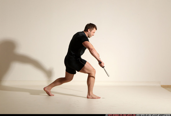 Man Adult Muscular White Fighting with sword Moving poses Sportswear