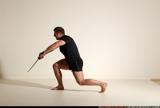 Man Adult Muscular White Fighting with sword Moving poses Sportswear