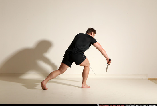 Man Adult Muscular White Fighting with sword Moving poses Sportswear