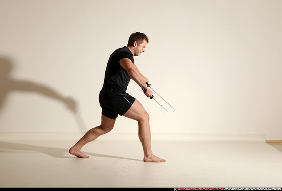 Man Adult Muscular White Fighting with sword Moving poses Sportswear