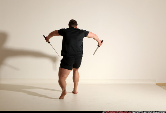 Man Adult Muscular White Fighting with sword Moving poses Sportswear