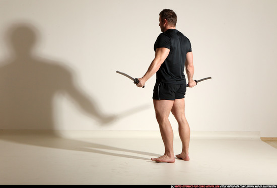 Man Adult Muscular White Fighting with sword Moving poses Sportswear